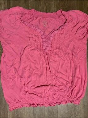 Pink Y2K babydoll top with ruffles and lace details and floral design